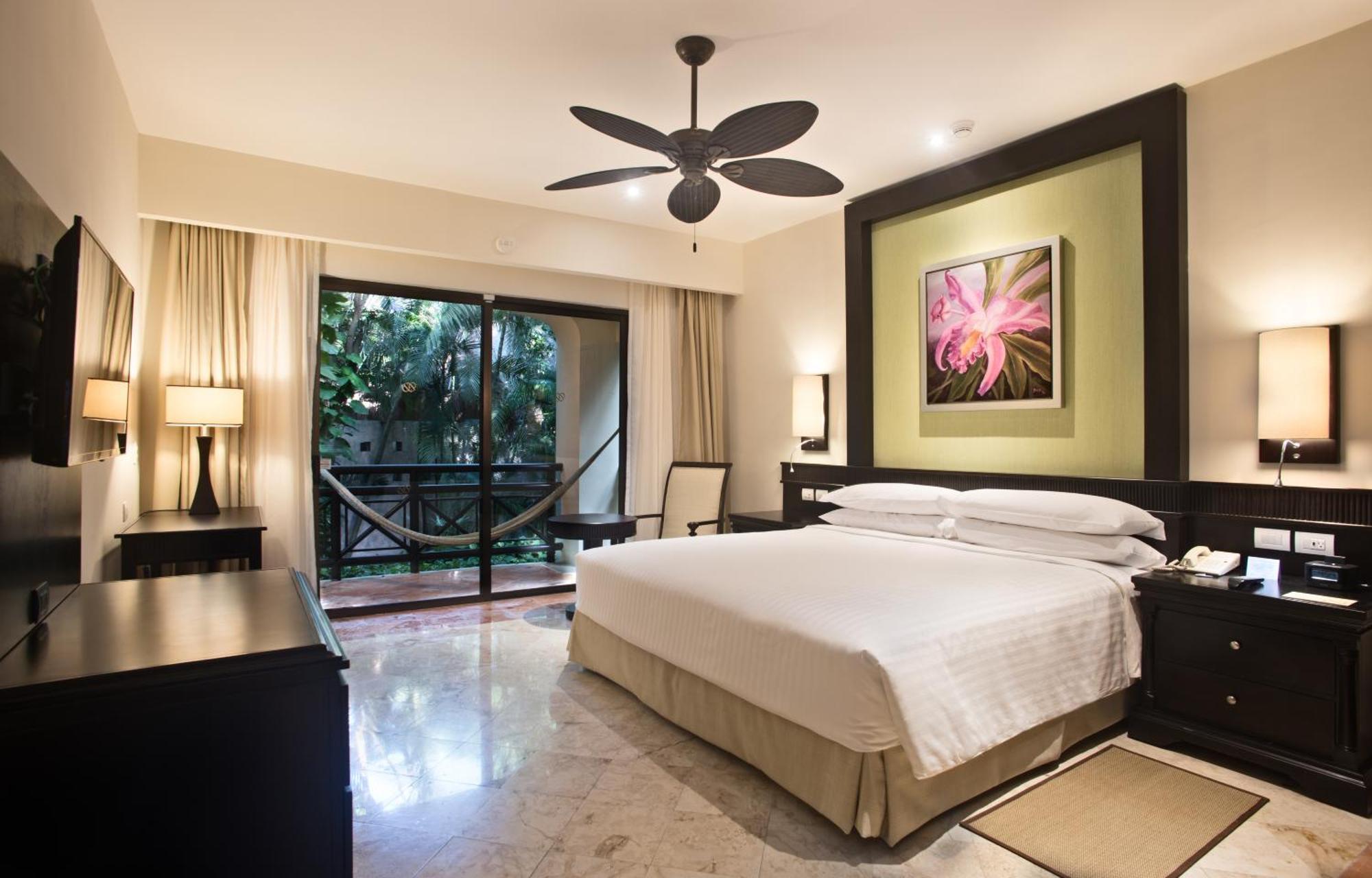 Occidental At Xcaret Destination Ξενοδοχείο Xcaret Park Εξωτερικό φωτογραφία A bedroom at the Hard Rock Hotel